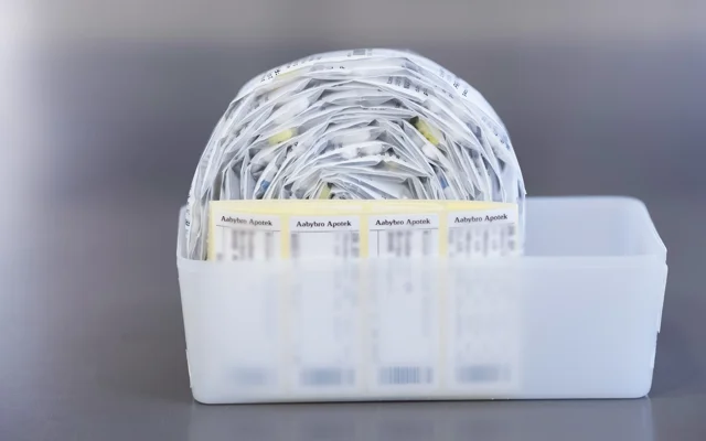 Dosisrulle i plastikbøtte